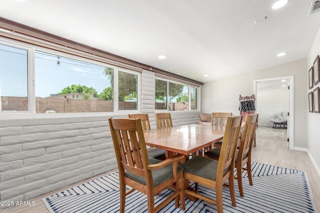 7727 E 4th St, Scottsdale, AZ 85251 - dining space featuring visible vents, recessed lighting, light wood-style flooring, and baseboards