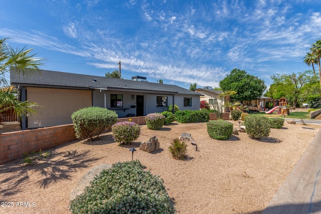 7727 E 4th St, Scottsdale, AZ 85251 - view of front of home with a playground