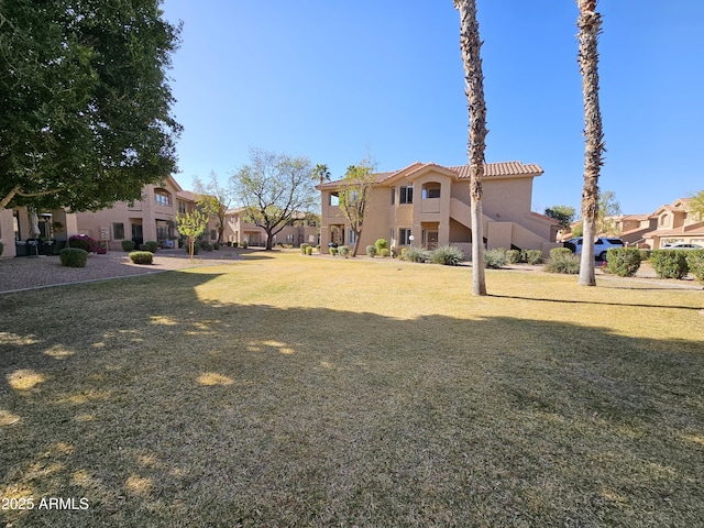 view of yard featuring a residential view