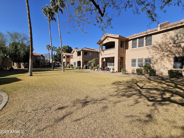 view of community featuring a lawn