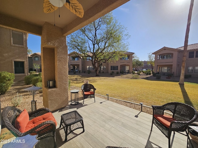 view of patio featuring a residential view and a deck