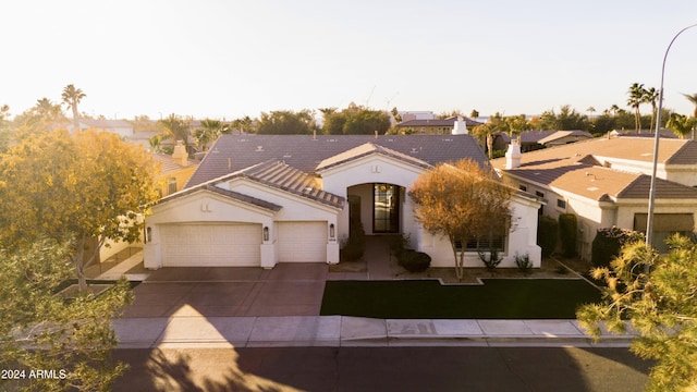 view of front of home with a garage