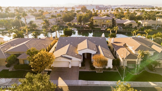 bird's eye view with a water view