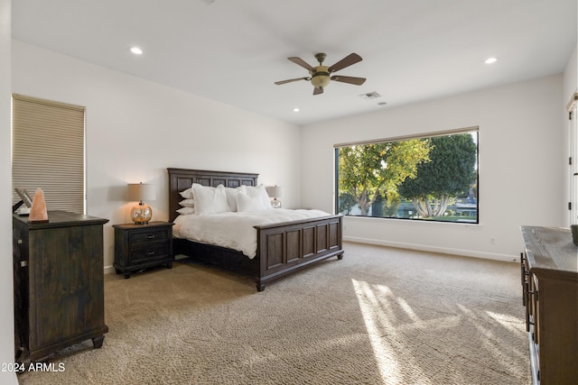 carpeted bedroom featuring ceiling fan