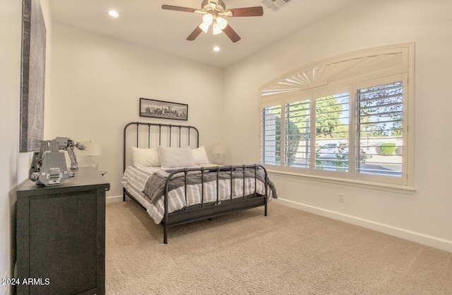 carpeted bedroom featuring ceiling fan