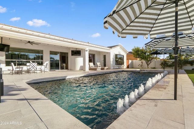 view of swimming pool with a patio