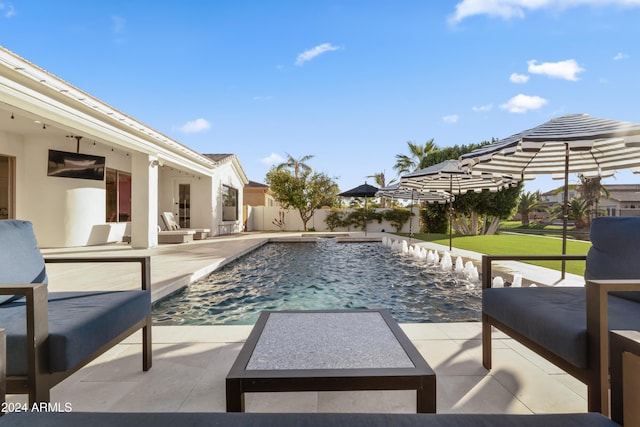 view of pool featuring a patio and pool water feature