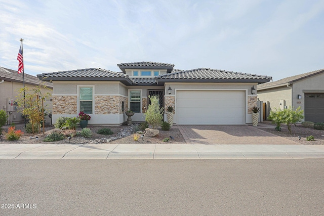 view of front of property with a garage