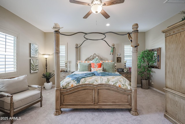 carpeted bedroom with ceiling fan