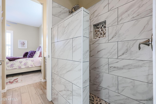 bathroom featuring tiled shower