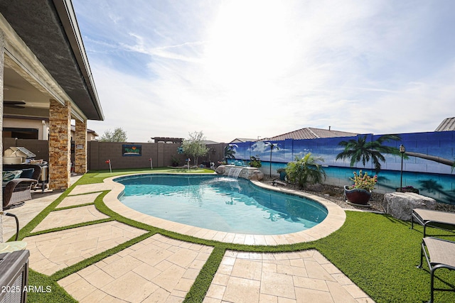 view of swimming pool featuring pool water feature and a patio area