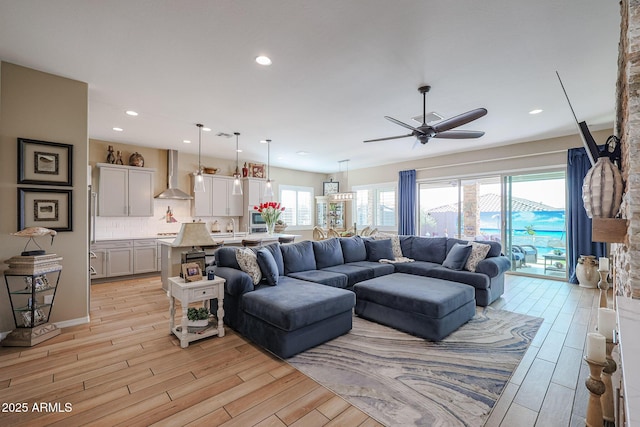 living room featuring ceiling fan