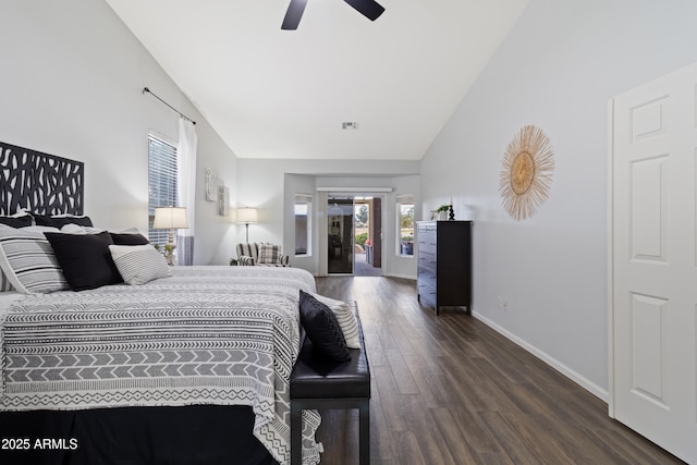 bedroom featuring dark hardwood / wood-style flooring, access to exterior, high vaulted ceiling, and ceiling fan