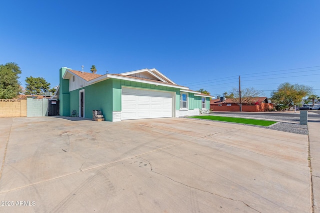 view of side of property featuring a garage