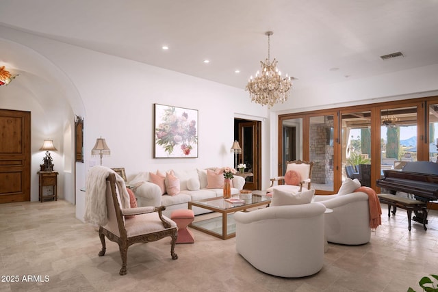 living room with a notable chandelier