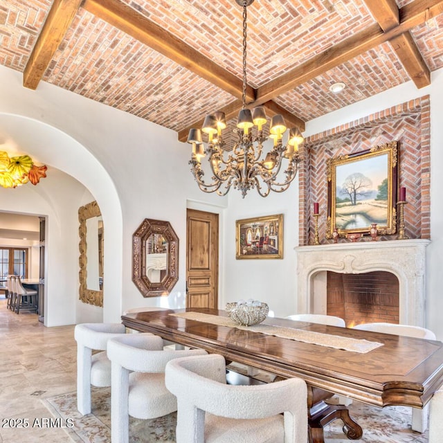 9547 N 55th St, Paradise Valley, AZ 85253 - dining room with brick ceiling, a chandelier, a premium fireplace, and beam ceiling