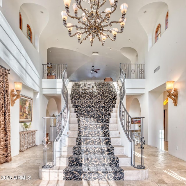9547 N 55th St, Paradise Valley, AZ 85253 - staircase featuring ceiling fan and a high ceiling