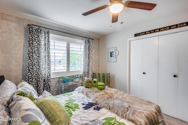 bedroom with a closet and ceiling fan