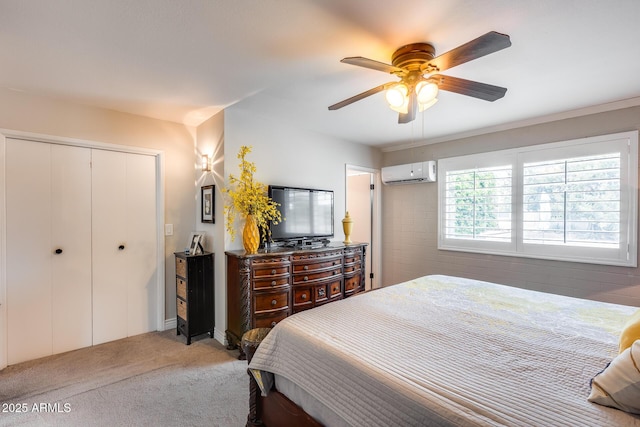 bedroom featuring light carpet, ceiling fan, an AC wall unit, and a closet