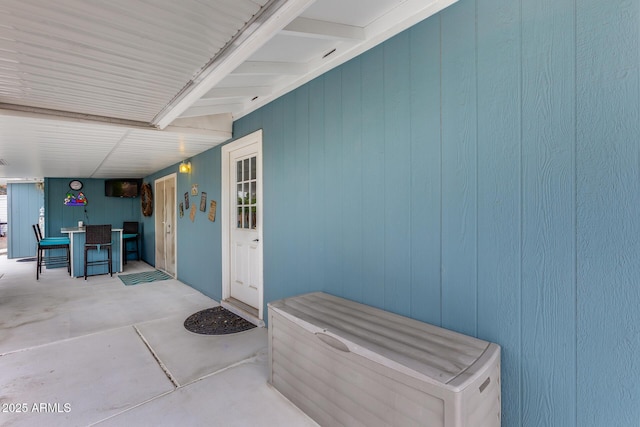 9928 W Hope Cir N, Sun City, AZ 85351 - doorway to property featuring a jacuzzi and a patio area