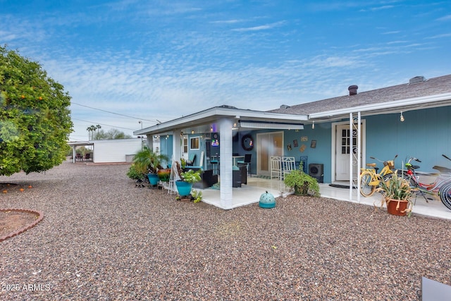 view of front of home with a patio area