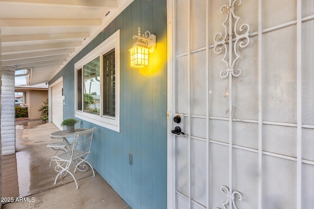 doorway to property with a porch