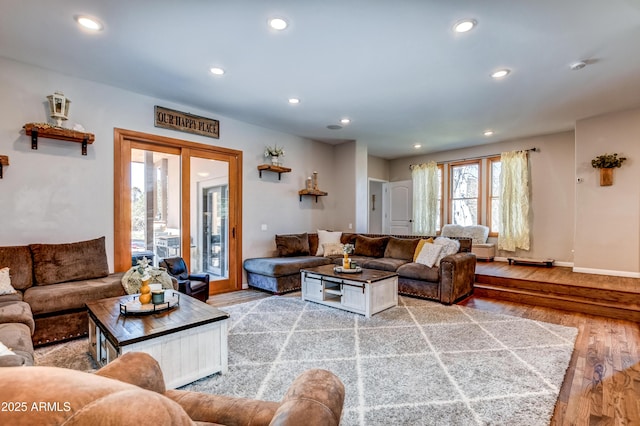 living room with light hardwood / wood-style floors