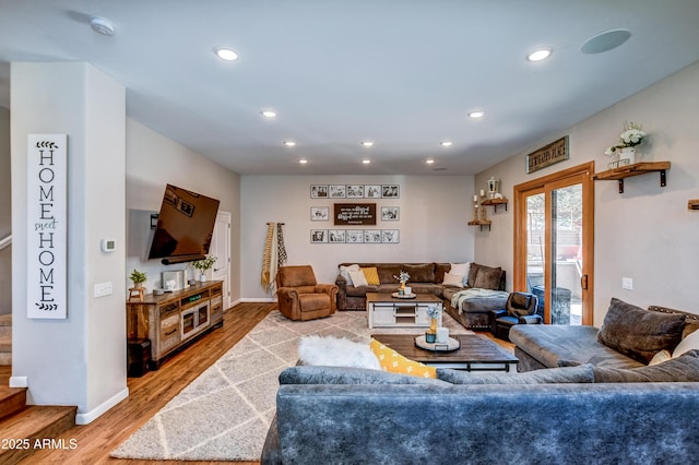 living room with light hardwood / wood-style floors