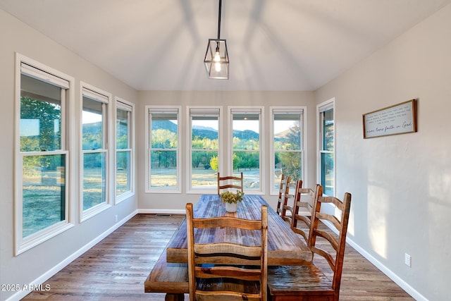 sunroom / solarium featuring a healthy amount of sunlight