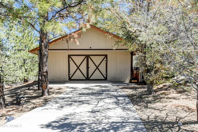 view of outdoor structure with a garage