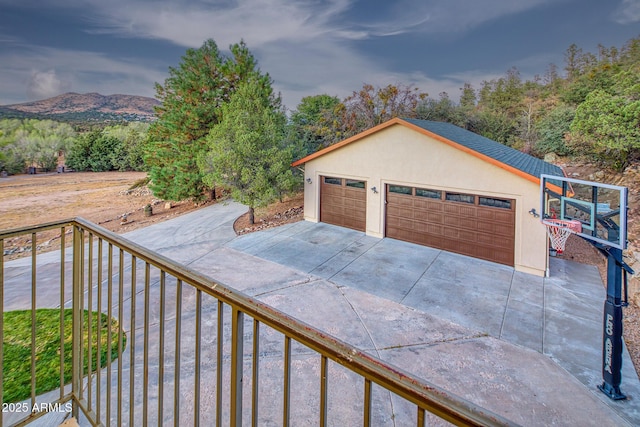 garage featuring a mountain view