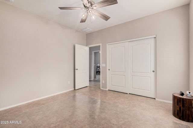 unfurnished bedroom with a closet and ceiling fan