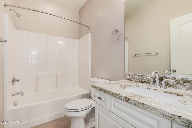 full bathroom featuring tile patterned flooring, vanity, tub / shower combination, and toilet