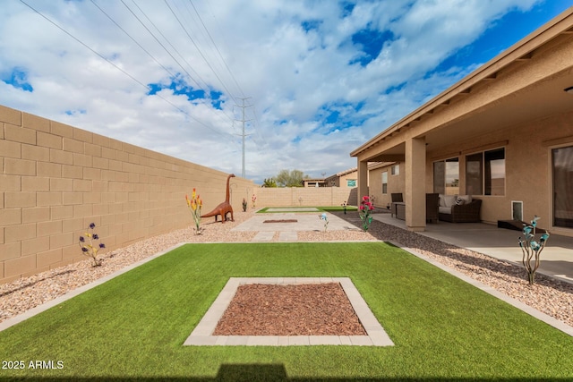 view of yard with a patio area