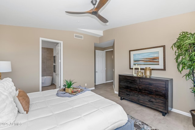 16255 E Ridgeline Dr, Fountain Hills, AZ 85268 - bedroom with lofted ceiling, light tile patterned floors, baseboards, ensuite bath, and visible vents