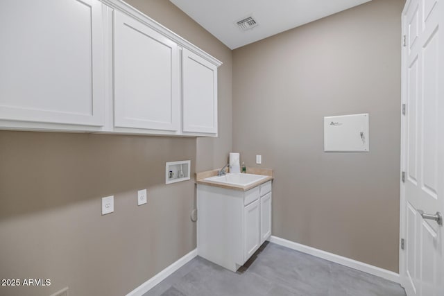 16255 E Ridgeline Dr, Fountain Hills, AZ 85268 - washroom with a sink, cabinet space, baseboards, and washer hookup