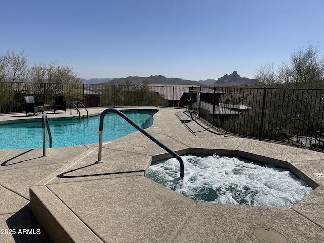 16255 E Ridgeline Dr, Fountain Hills, AZ 85268 - pool featuring a hot tub, a mountain view, fence, and a patio area