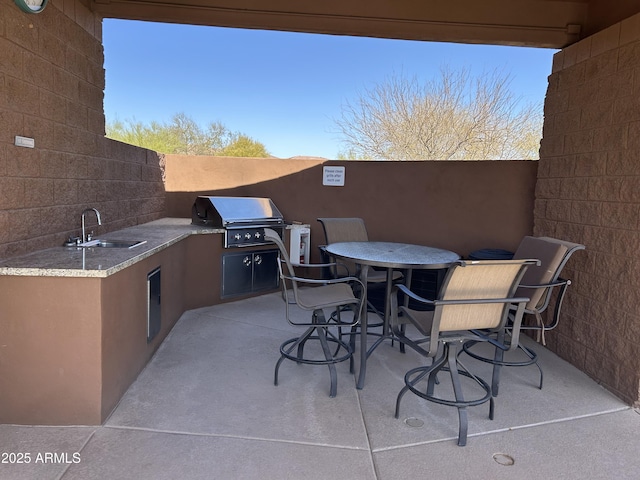 16255 E Ridgeline Dr, Fountain Hills, AZ 85268 - view of patio with area for grilling, a sink, outdoor dining area, and a grill