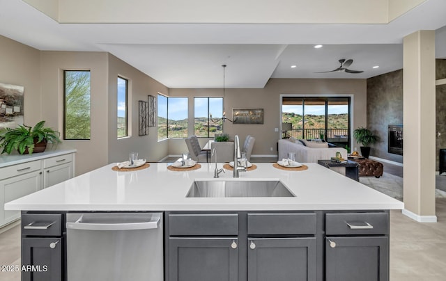 16255 E Ridgeline Dr, Fountain Hills, AZ 85268 - kitchen with stainless steel dishwasher, gray cabinetry, open floor plan, and a sink
