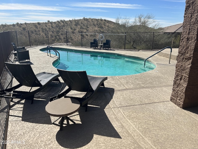 16255 E Ridgeline Dr, Fountain Hills, AZ 85268 - view of pool with a fenced in pool, a mountain view, fence, and a patio area