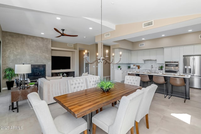 16255 E Ridgeline Dr, Fountain Hills, AZ 85268 - dining area featuring ceiling fan with notable chandelier and visible vents