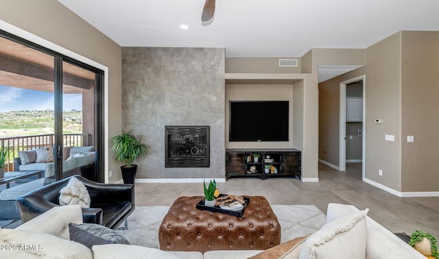 16255 E Ridgeline Dr, Fountain Hills, AZ 85268 - living area featuring baseboards, visible vents, and a fireplace
