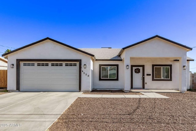 ranch-style house featuring a garage