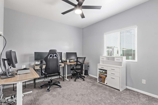 office area featuring light colored carpet and ceiling fan