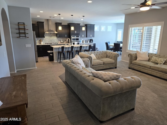 2316 N Crestwood Dr, Florence, AZ 85132 - living room with baseboards, a ceiling fan, recessed lighting, and dark wood-type flooring