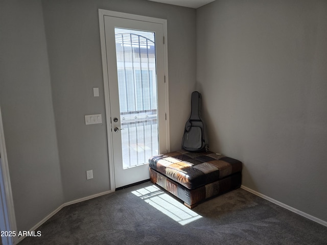 2316 N Crestwood Dr, Florence, AZ 85132 - doorway to outside featuring baseboards and carpet