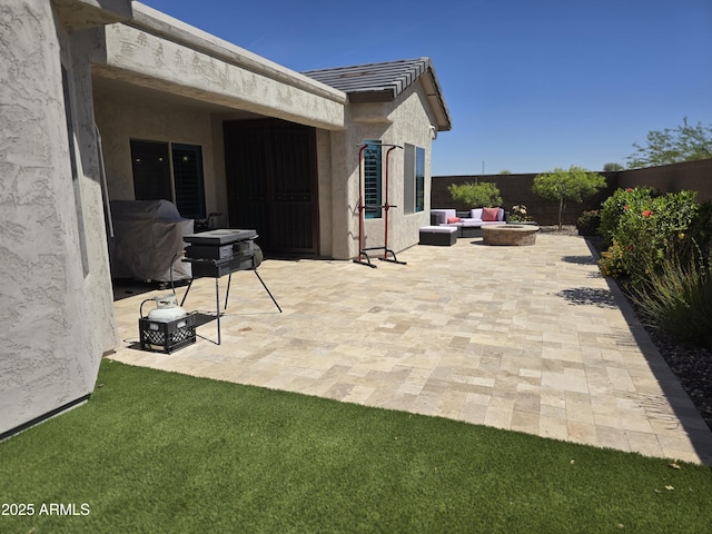 2316 N Crestwood Dr, Florence, AZ 85132 - view of patio with a fenced backyard and an outdoor fire pit