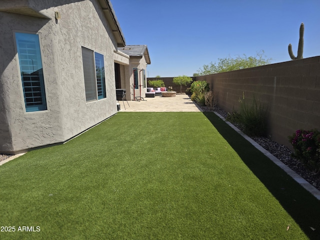 2316 N Crestwood Dr, Florence, AZ 85132 - view of yard featuring a fenced backyard, a patio area, and an outdoor hangout area