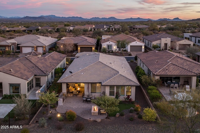 aerial view at dusk with a mountain view