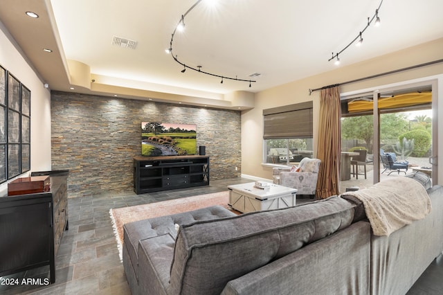 2378 N 158th Dr, Goodyear, AZ 85395 - living area with track lighting and stone finish floors